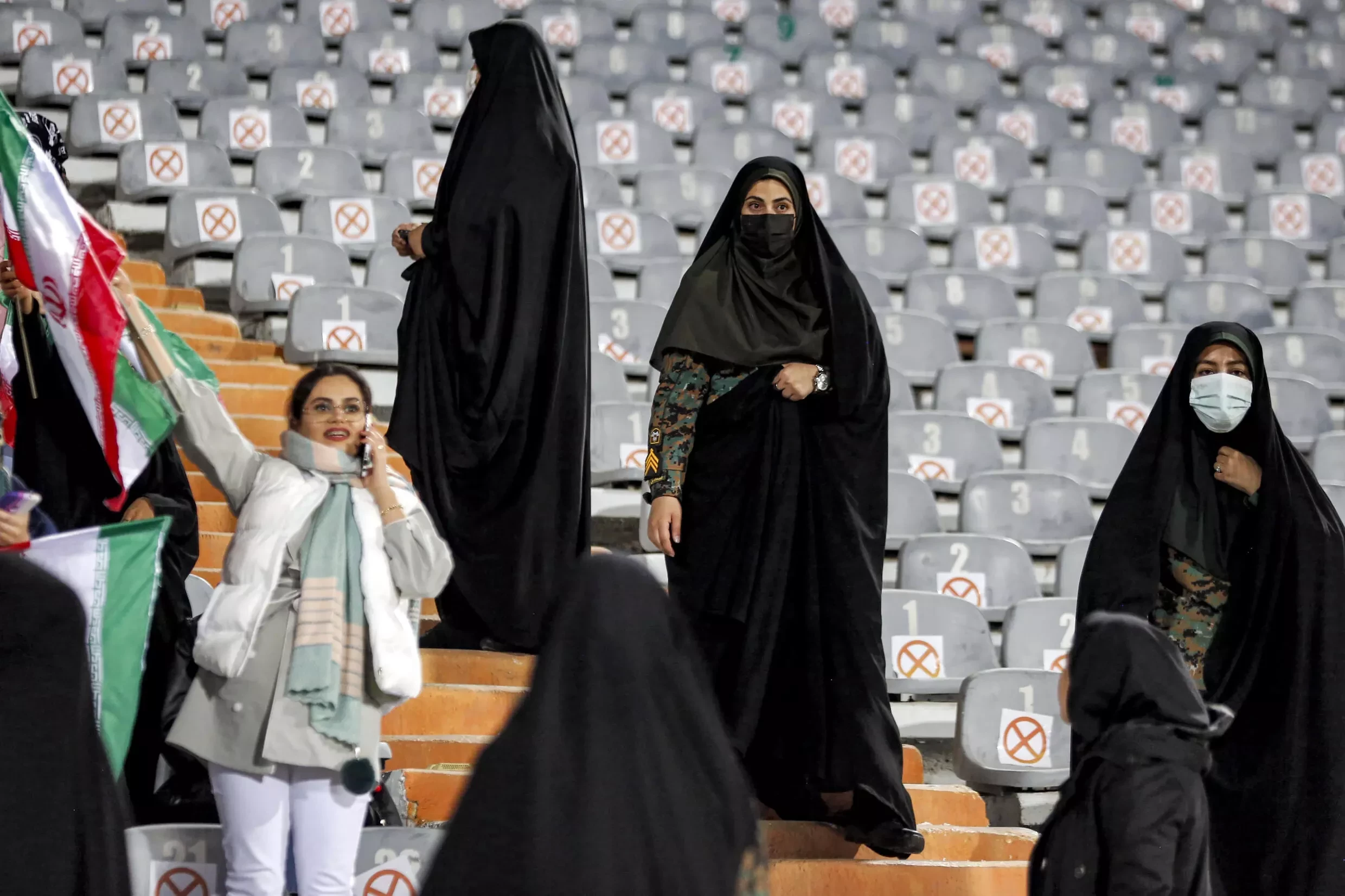 iranian draft law proposing new penalties for women defying dress code sparks debate